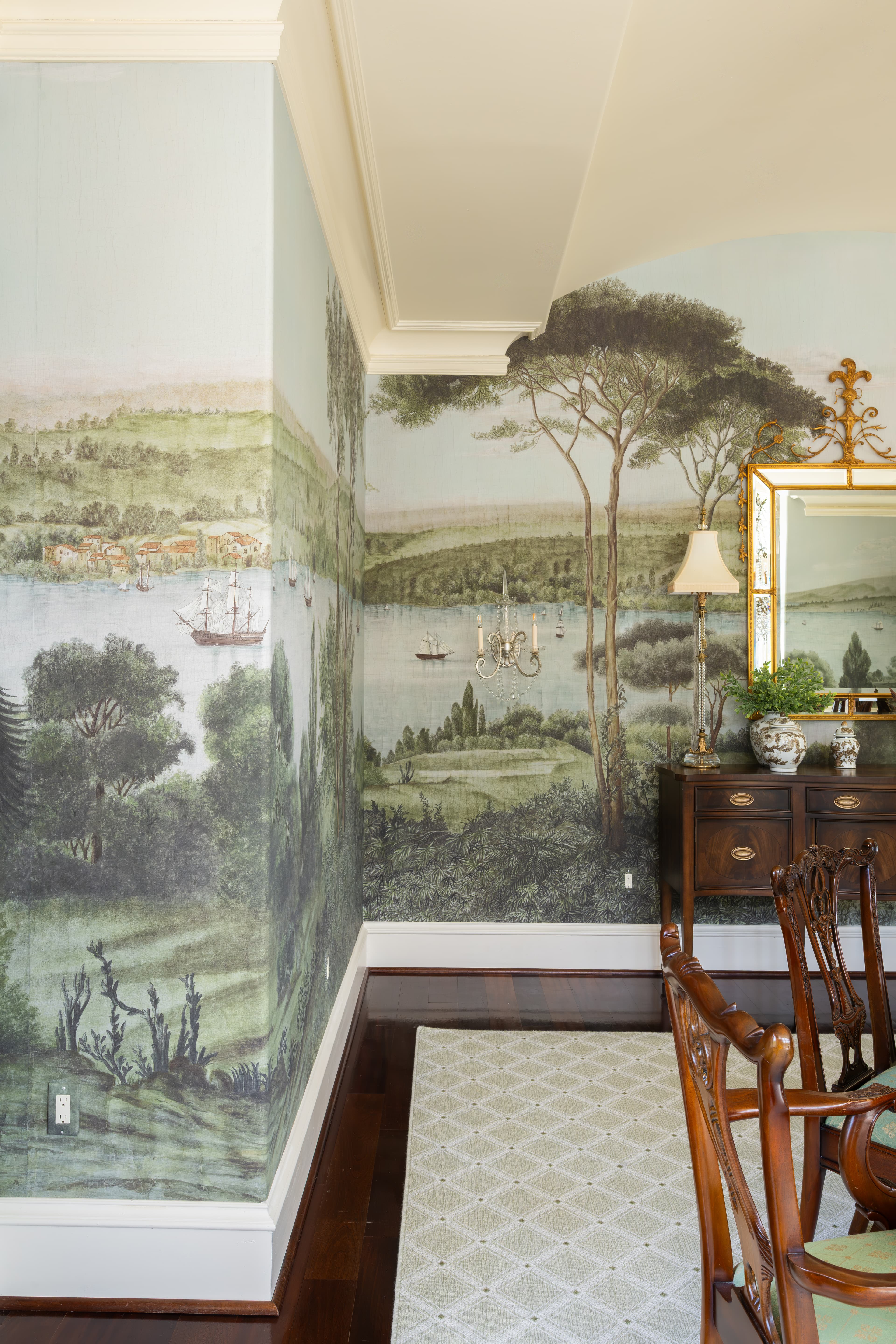English paper mural installation — panoramic scenic wallcovering in a dining room